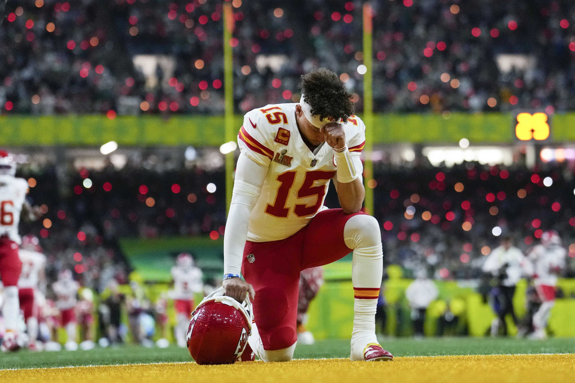 Patrick Mahomes tries to stay strong attending his grandfather's funeral and prioritizing family over the NFL