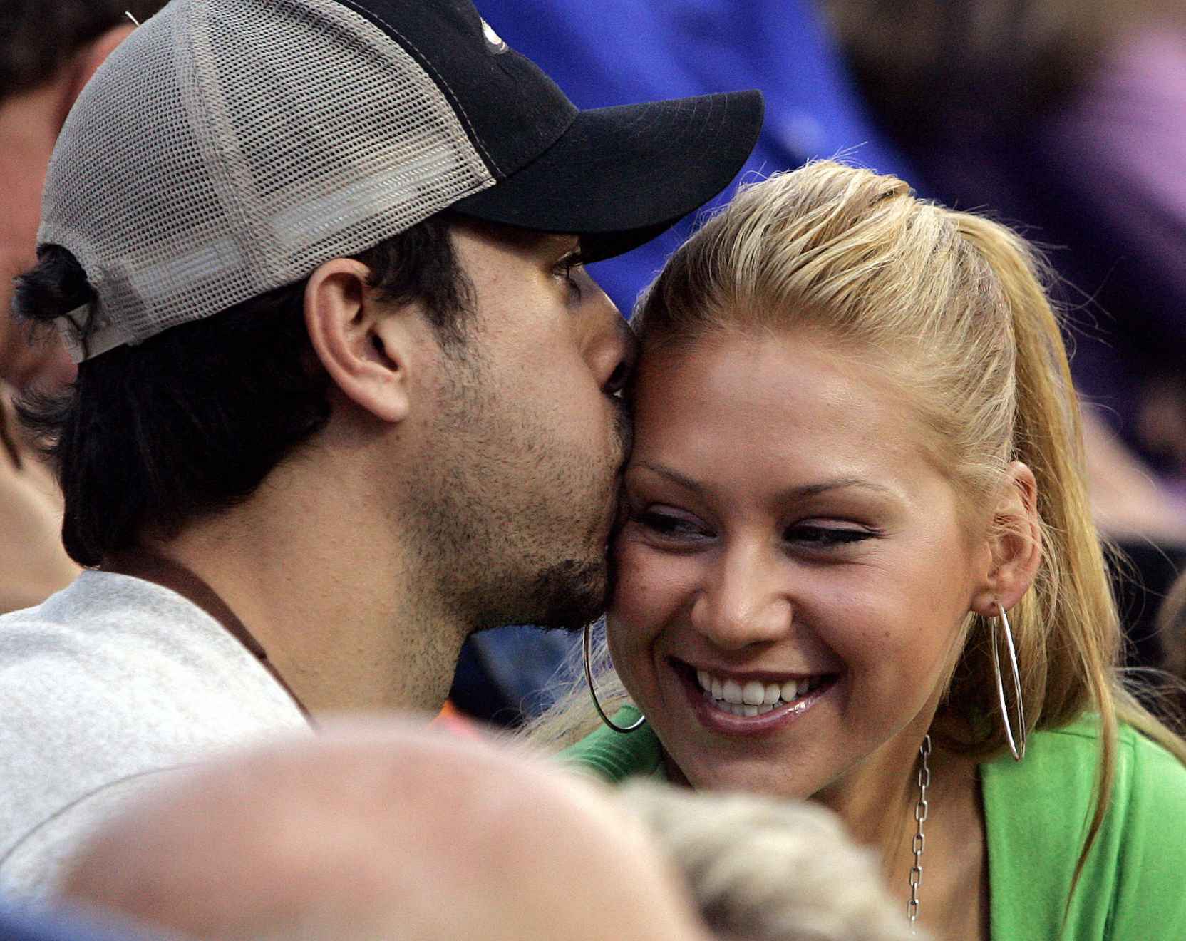 Anna Kournikova and Enrique Iglesias live in an exclusive neighborhood with mansions valued at up to $14.9 million