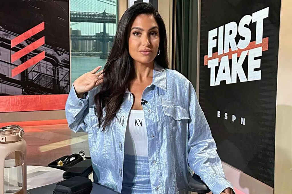 Molly Qerim supports a Celtics player