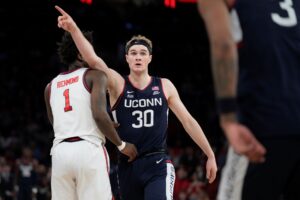 While Liam McNeeley shined, all eyes were on his mother