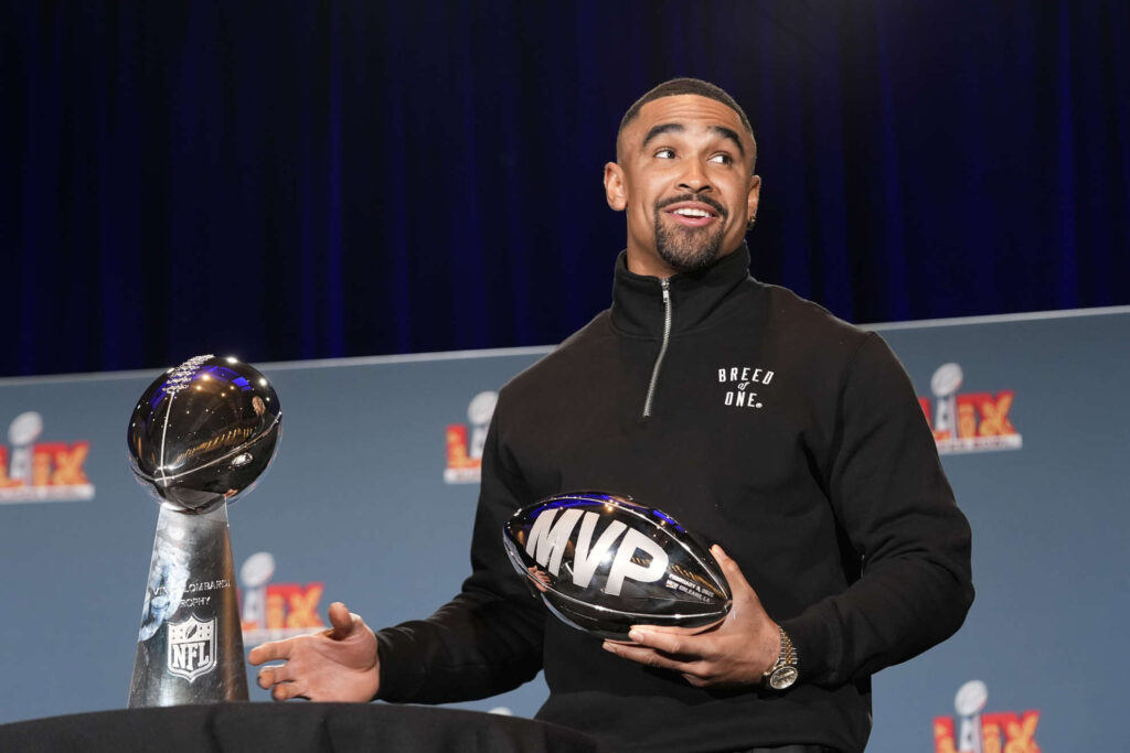 Jalen Hurts celebrates the title in style—with two rings in one year
